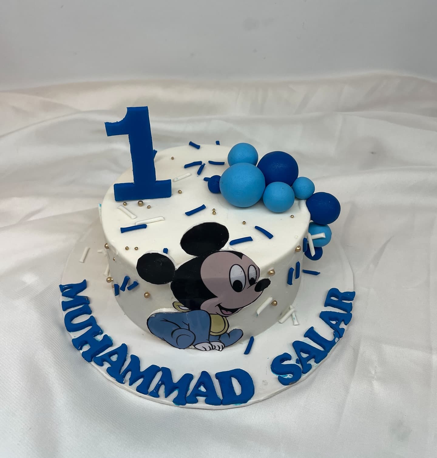 Mickey Mouse themed cake for a child's birthday